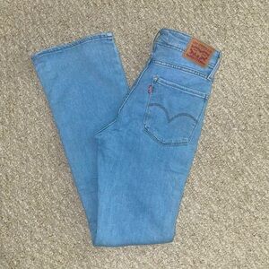 Levis 725 High Rise Bootcut Jeans W25
